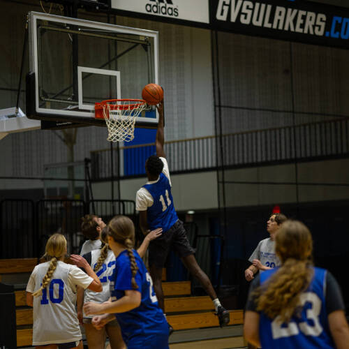 students playing basketball